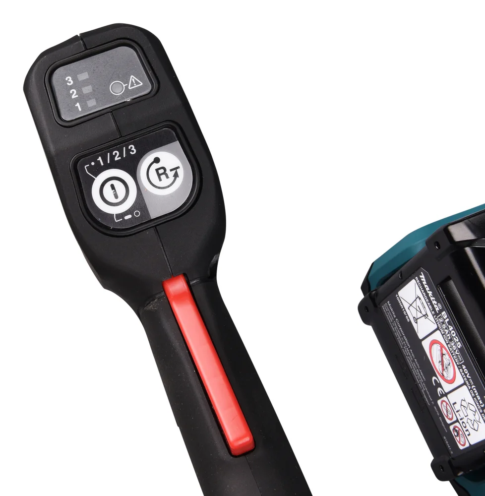 Makita UH014GZ - Przycisk obrotów wstecznych