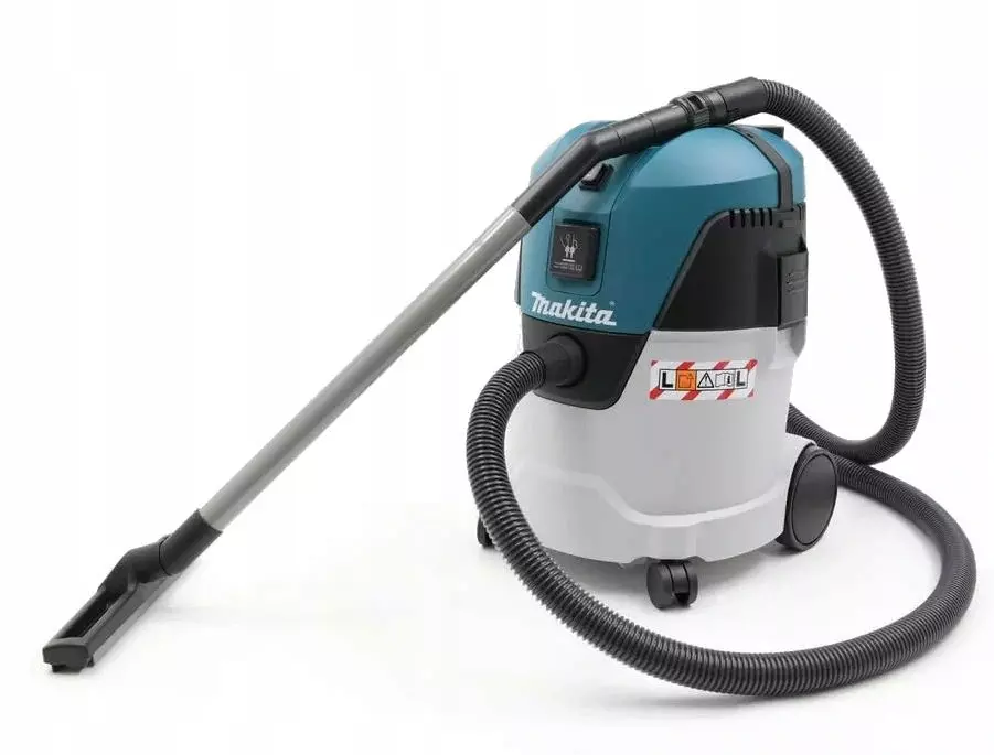 Makita VC2512L - Filtr można czyścić jednym naciśnięciem przycisku, a maszyna posiada zbiornik z tworzywa sztucznego o pojemności 25 l.
